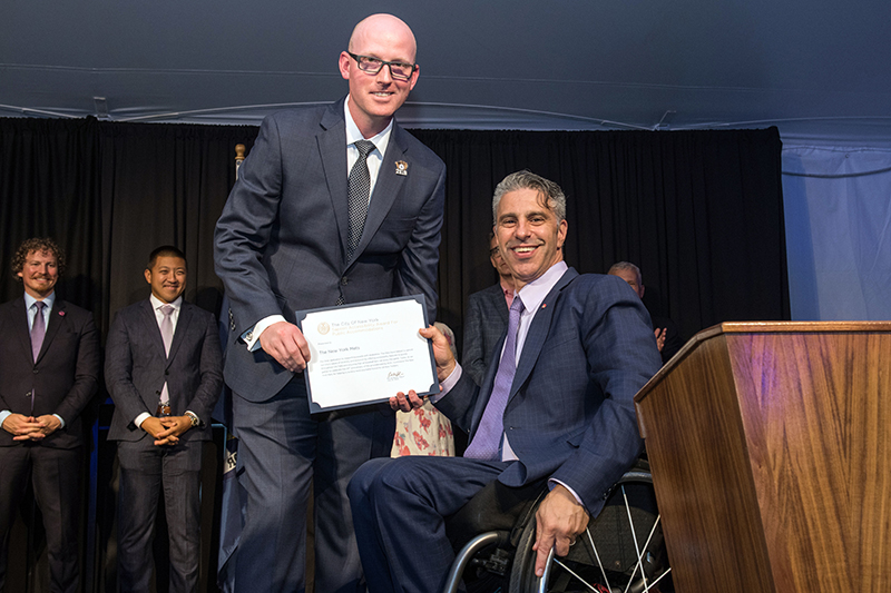 Image of Public Accommodations Award Accepted by Eric Petersen, Accessibility Coordinator and Director of Ticket Services for New York Mets